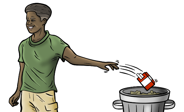 A smiling male service member tossing a pack of cigarettes into the trash